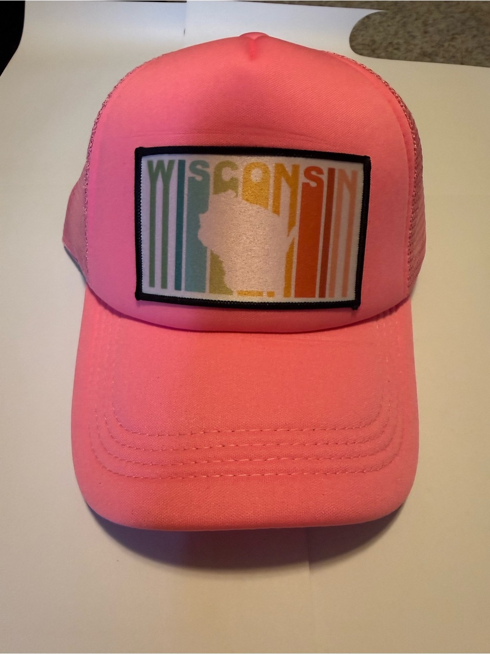 Pink Wisconsin Trucker Hat with Rainbow Patch